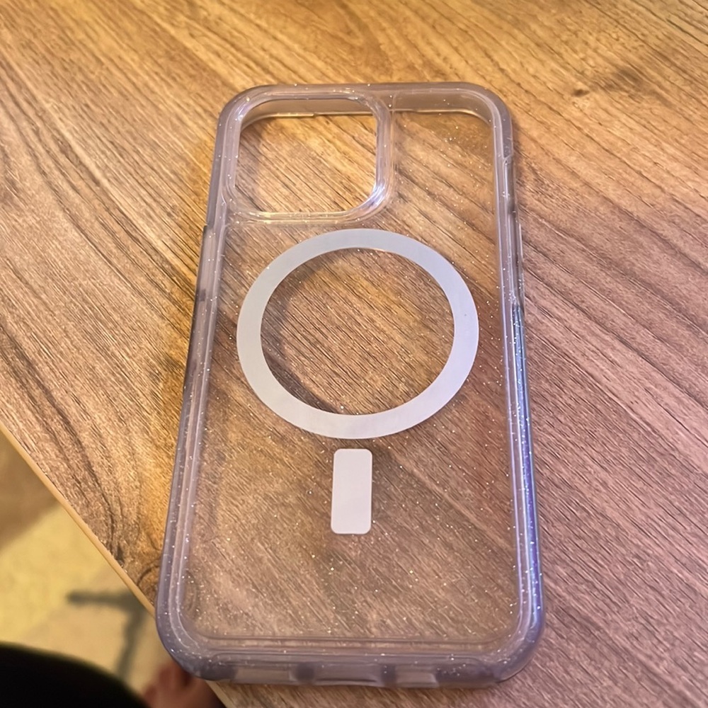 iPhone 13 Pro Otterbox with mag safe charging ring.